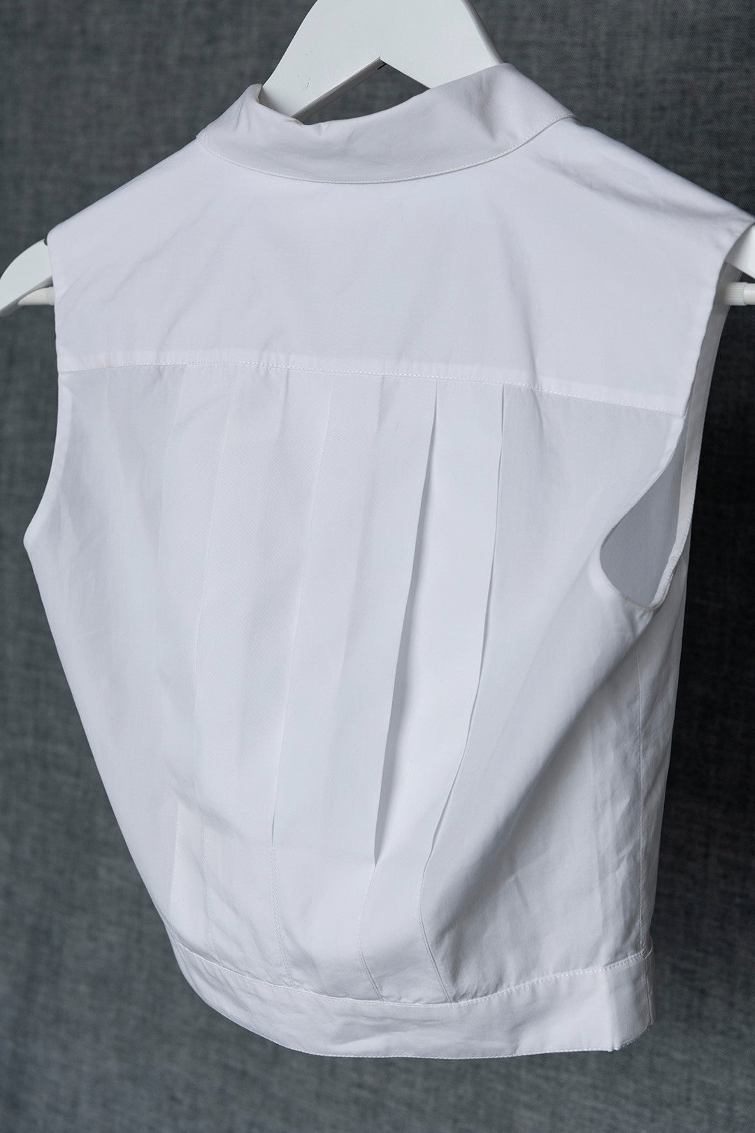 TOP SMANICATO BIANCO
