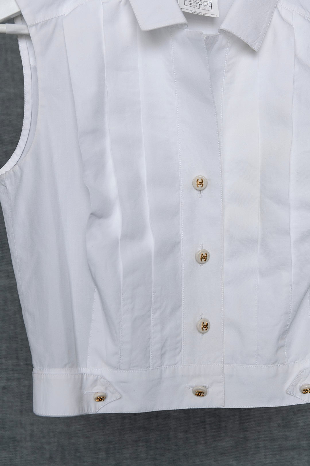 TOP SMANICATO BIANCO