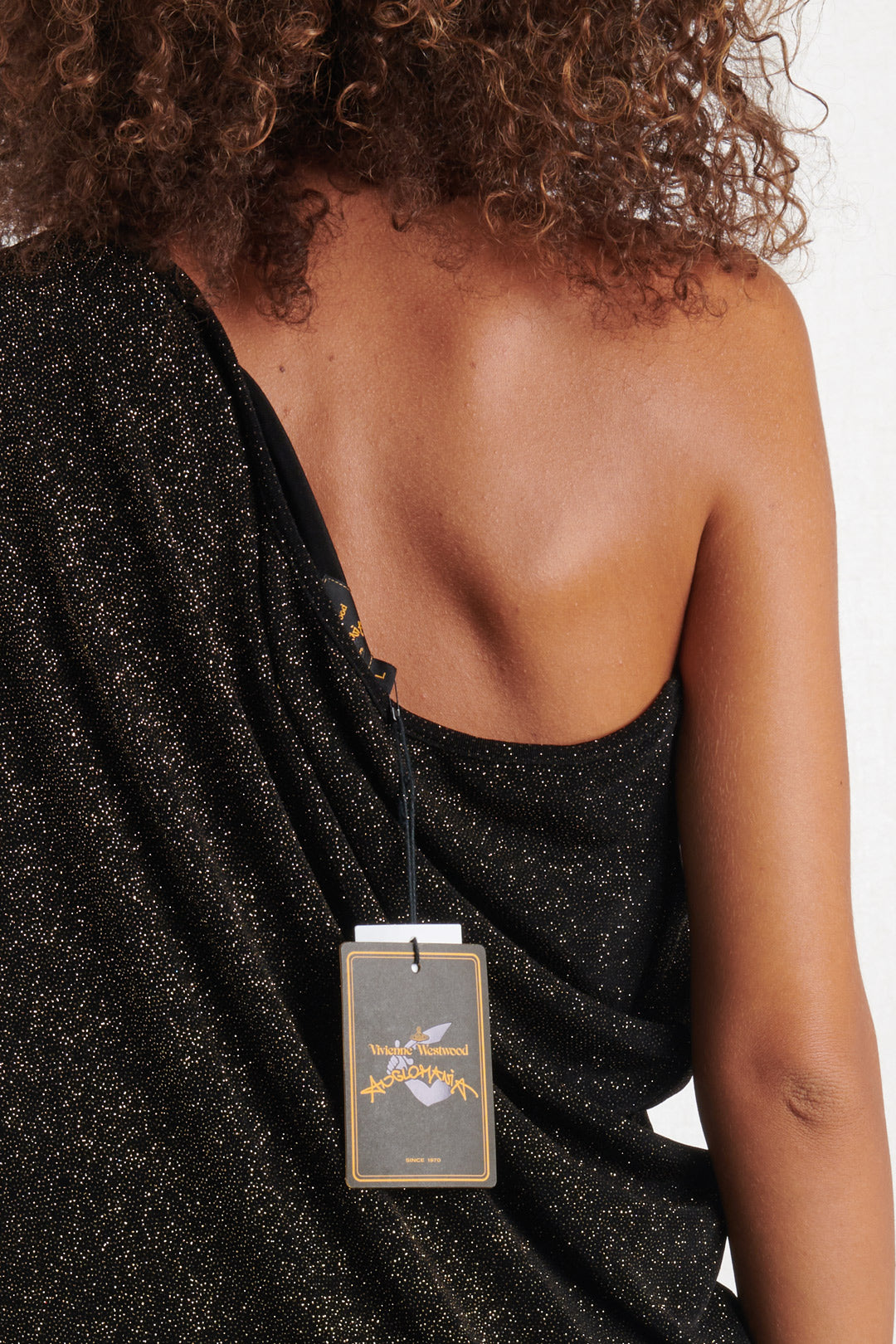 VESTITO NERO CON BRILLANTINI ORO