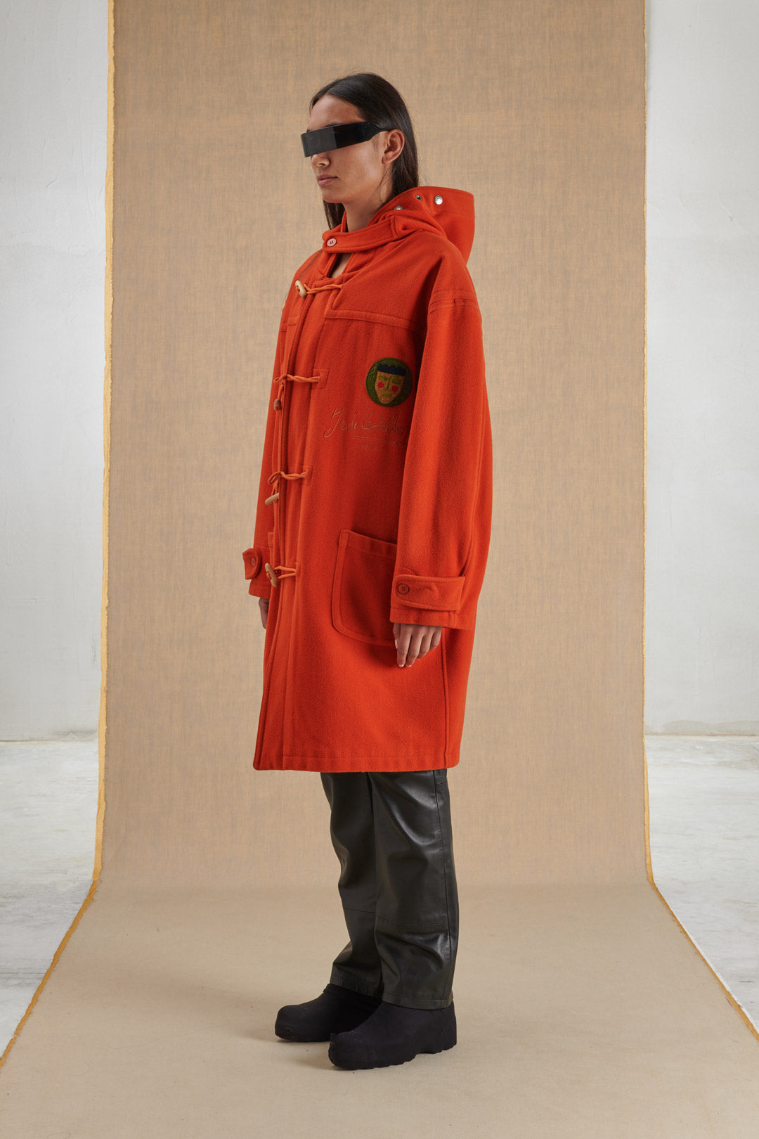 ORANGE MONTGOMERS WITH CONTRAST EMBROIDERY AND LINING
