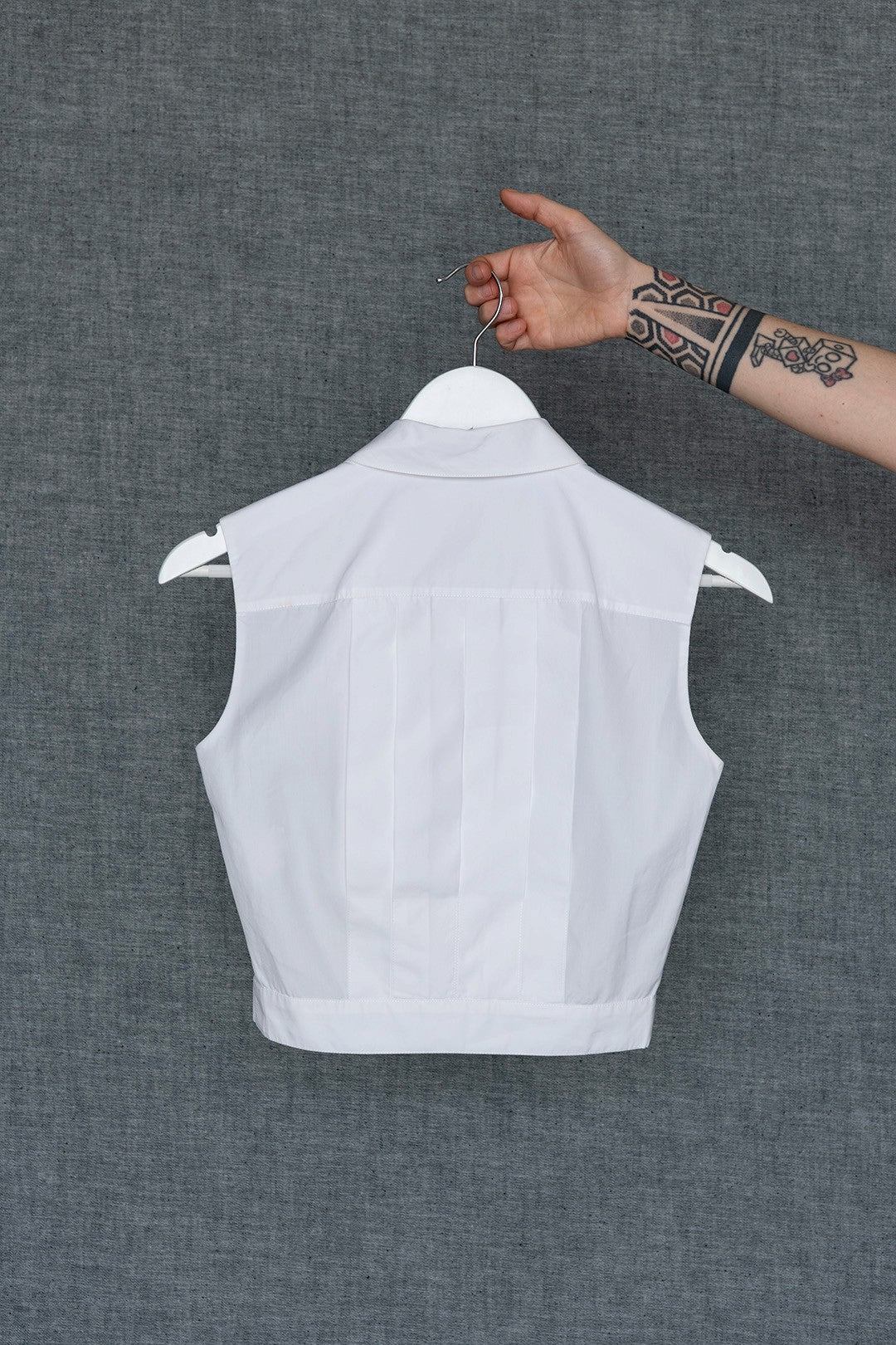 TOP SMANICATO BIANCO
