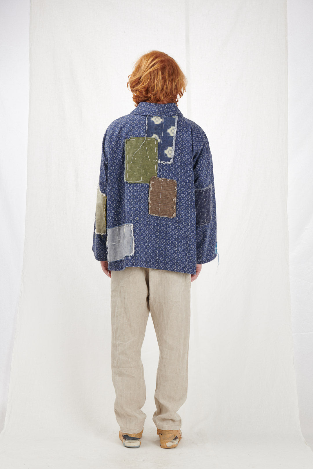 KIMONO CON TOPPE IN TESSUTO